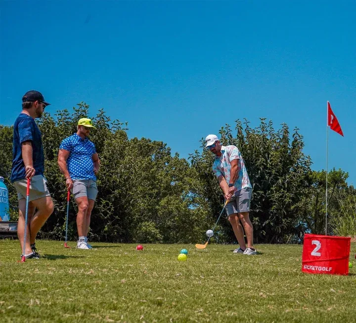 Bucket golf in action on the green